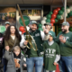 Grand Opening Celebration: Denis and Family Joyfully Cut the Ribbon at New York Pizza's Newest Store.