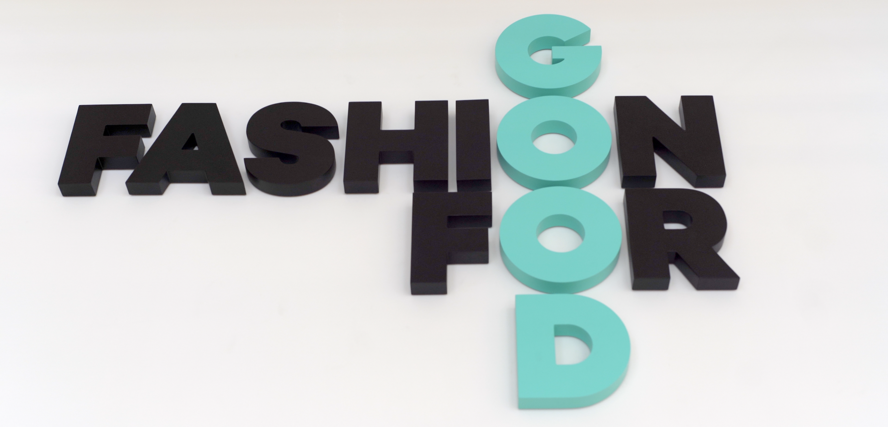 Fashion For Good Logo in the main room.